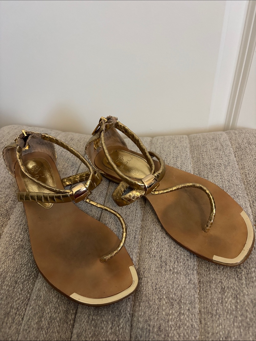 Isola Gold Metallic Leather T-Strap Sandals